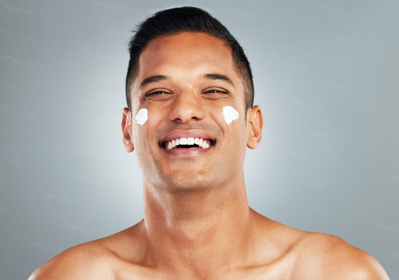 Buy stock photo Happy man, face cream skincare and portrait moisturizer, healthy aesthetic and glowing skin on grey studio background. Smile headshot, male model or facial dermatology product, cosmetics and wellness