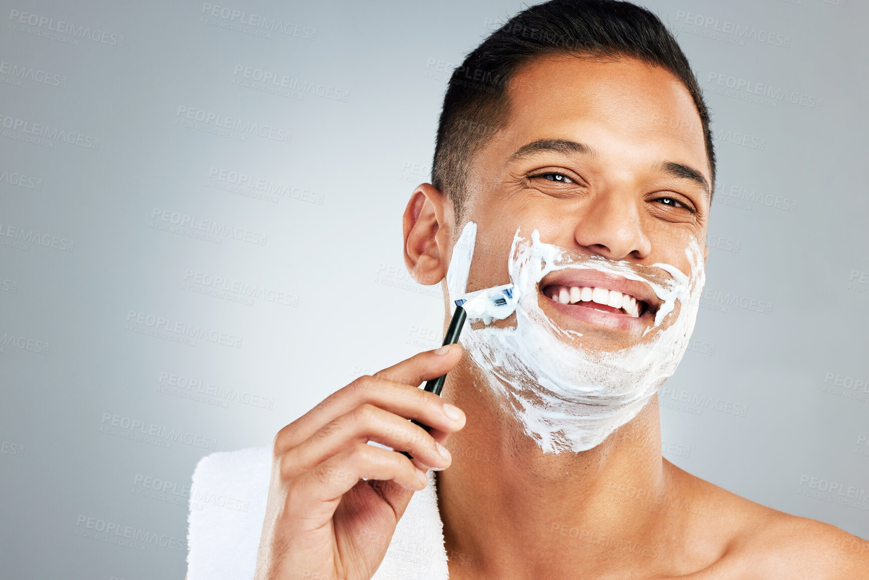 Buy stock photo Skincare, facial and man shaving beard or face hair for cleaning cream and razor. Happy latino male shave, handsome and epilation care of skin during morning routine for beauty and hygiene wellness 
