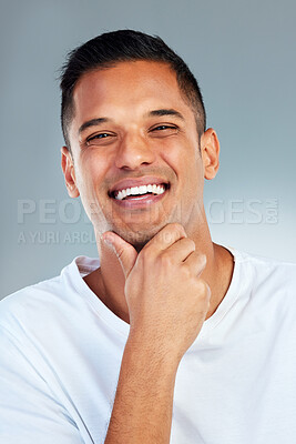 Buy stock photo Man, portrait and smile with teeth in fresh or clean hygiene against a grey studio background. Happy male smiling for healthy lifestyle in satisfaction for dental, mouth and oral or gum care