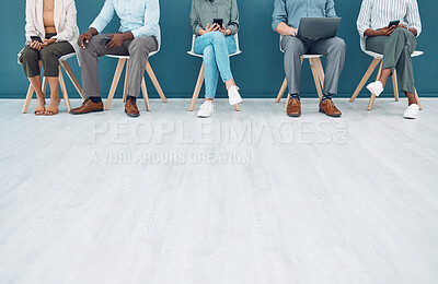 Buy stock photo Business people, legs and job interview wait on technology in studio, startup company or digital marketing office. Men, women and workers line in human resources, global recruitment or hr tech review