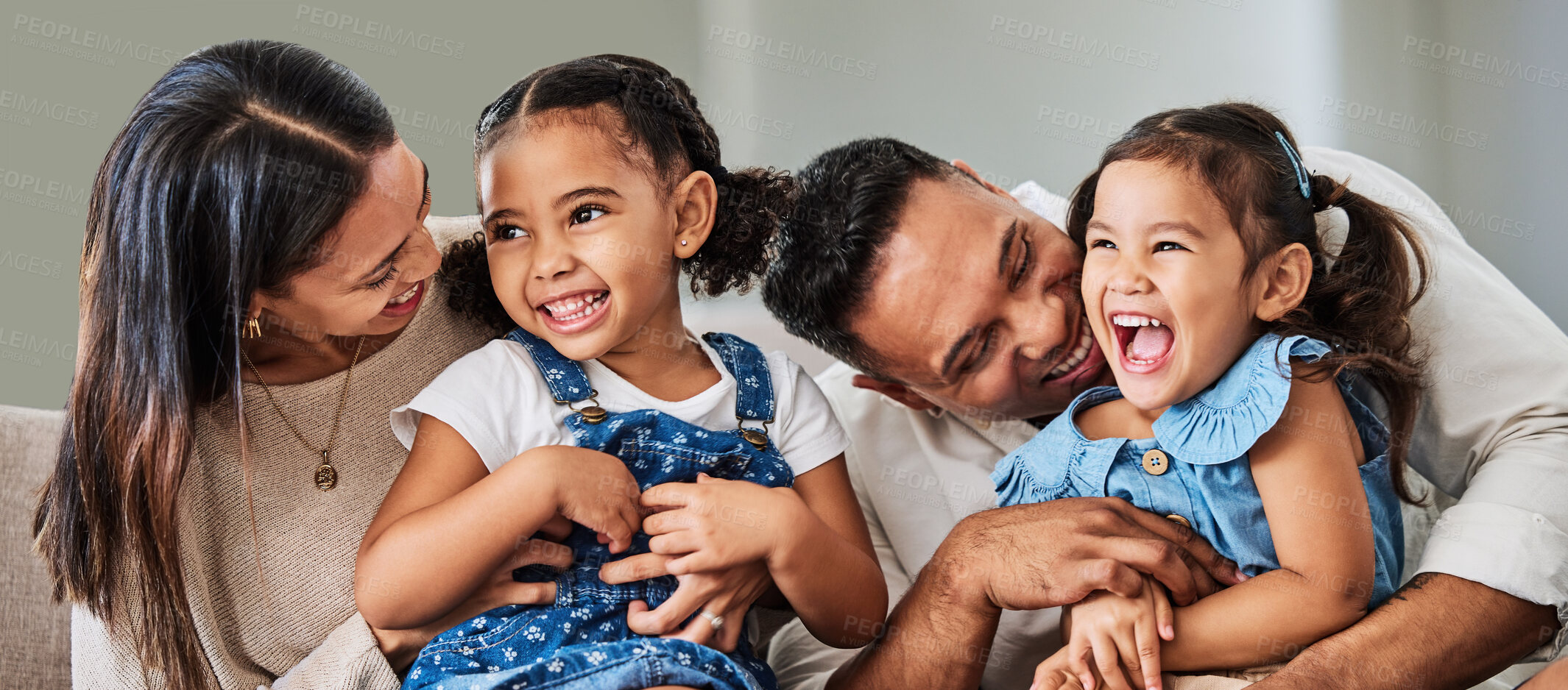 Buy stock photo Love, care and parents with happy family of children laughing together at home in Puerto Rico. Mama, father and daughter siblings bonding in house with cheerful affection and excited smile.

