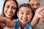 Family, selfie and happy, parents and child together, bonding and spending quality time in family home. Mother, father and kid smile, trust and love with care in closeup portrait, picture perfect.