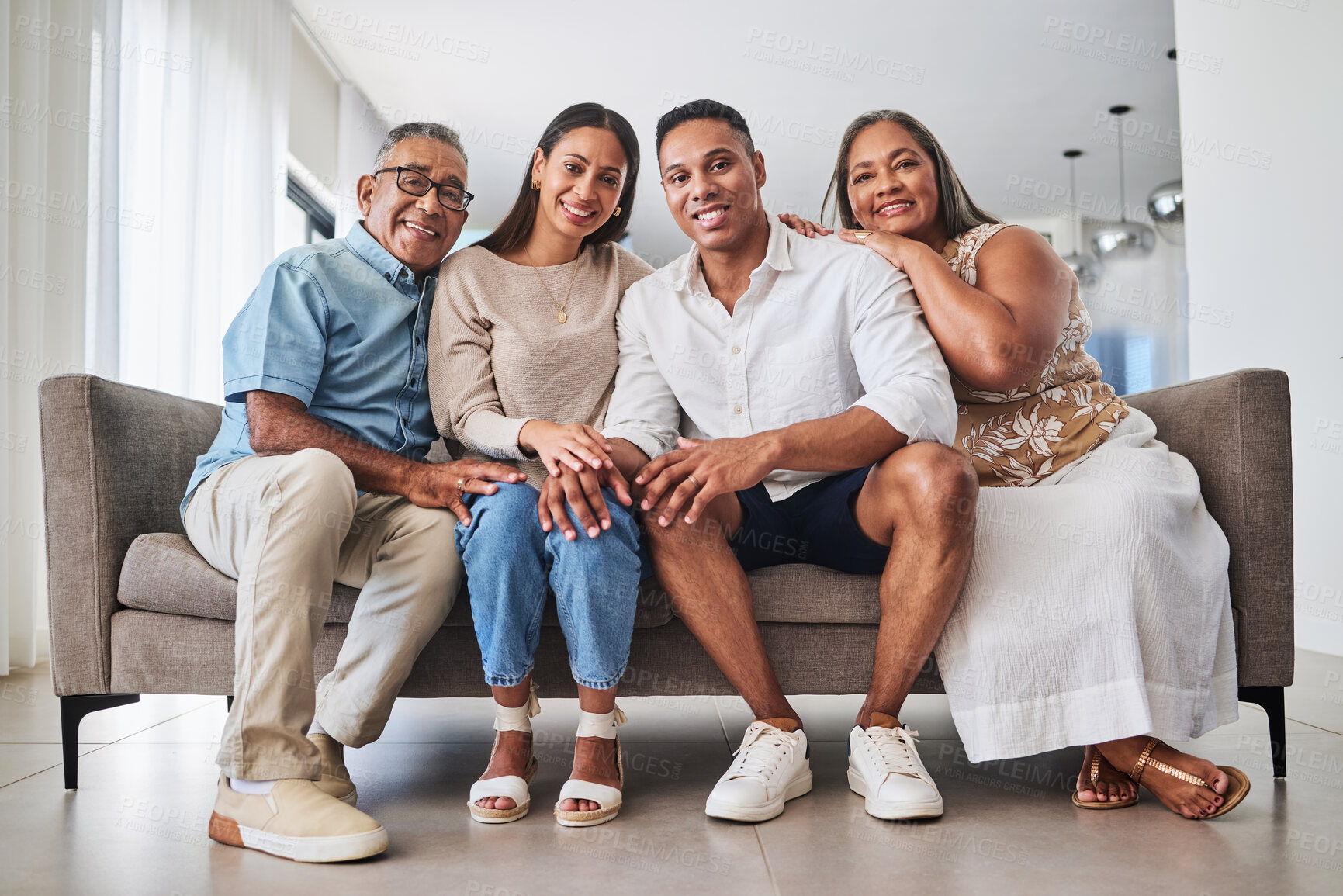 Buy stock photo Happy family, love and home with support senior parent and adult children together on sofa in living room with mother, father and young couple. Portrait of men and women in brazil house to relax