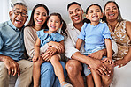 Happy, big family and portrait smile for relationship happiness in quality bonding time together at home. Parents, grandparents and kids smiling for relaxing holiday break or free time at the house