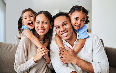 Buy stock photo Love, happy family and sofa bonding in a living room with cheerful, fun and loving people. Family, portrait and kids embracing cheerful parents, enjoying relaxing, quality time indoors in their home