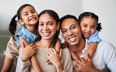 Buy stock photo Hug, children and parents on the sofa in the living room of their house for love, care and smile together. Face portrait of young, happy and hugging kids with affection for mother and father