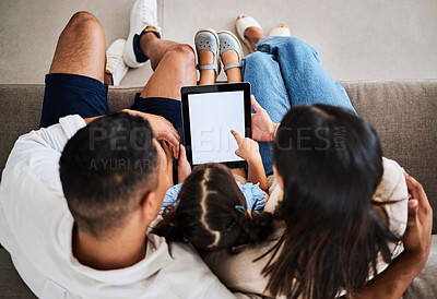 Buy stock photo Blank family tablet, child and green screen with mockup of kids app watching on a home sofa. Kid online education, internet and web scroll of a girl, mother and dad watching online content together
