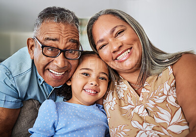 Buy stock photo Family, grandparents and child portrait in a house relaxing, bonding and having fun in retirement on a weekend. Smile, grandma and grandpa hugging and enjoy quality time with a happy girl in Bogota