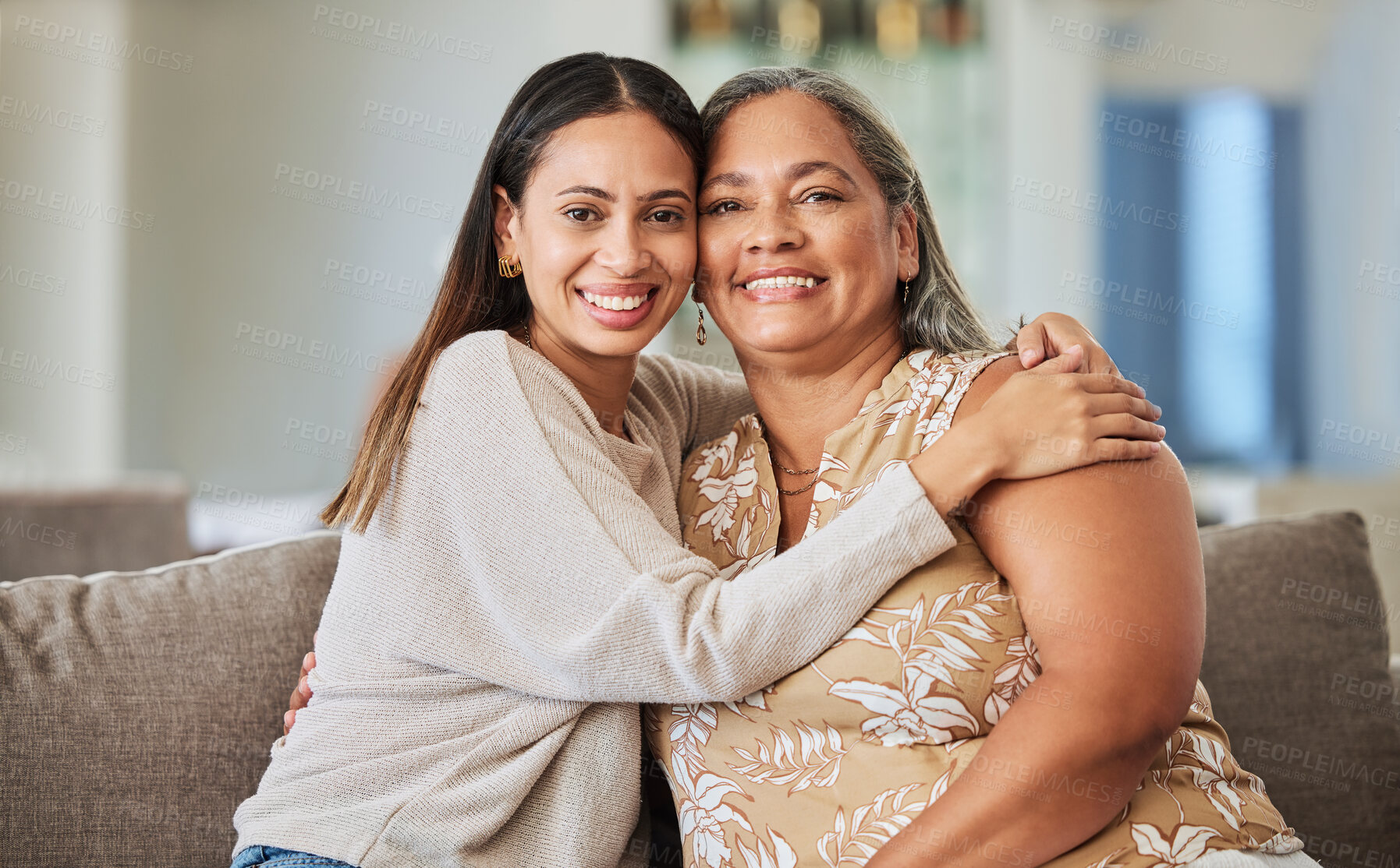 Buy stock photo Woman, happy and hug of a mother and adult child on a home living room lounge couch with love. Portrait of people from Mexico smile on a house sofa with care, happiness and quality time together