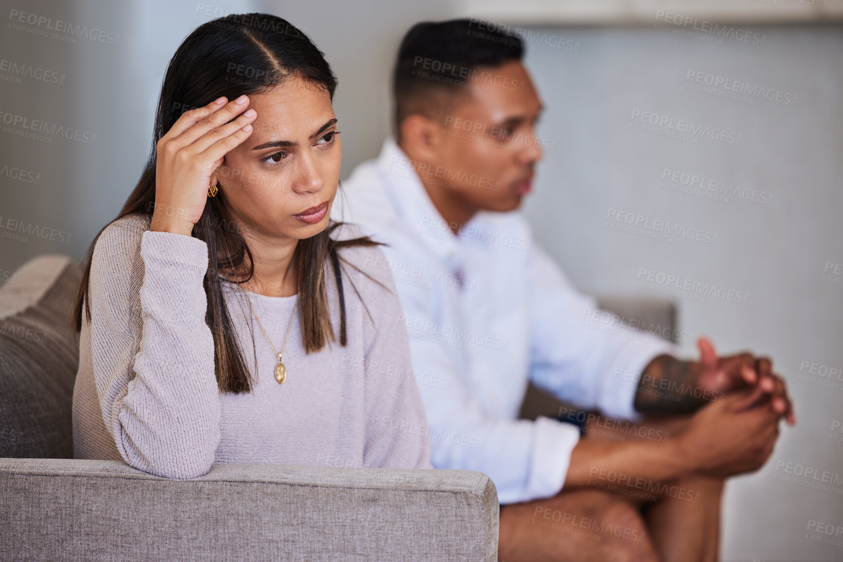 Buy stock photo Divorce, sad and fight with couple on sofa  with marriage problems feeling frustrated, conflict or angry. Thinking, therapy or counseling with man and woman in living room for fail, decision or fear