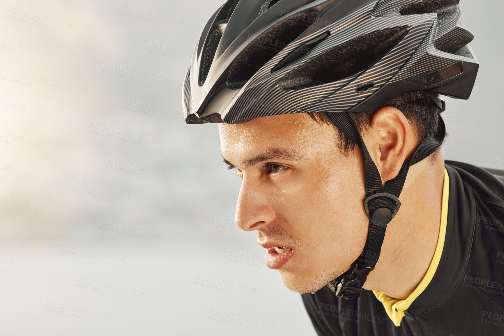 Buy stock photo Fitness, man and head of cycling helmet for sports motivation in exercise, workout and training on mockup background. Closeup of tired male sweating from intense cycle tour in healthy cardio sport 