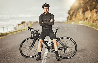 Buy stock photo Man, cycling and mountain bike with arms crossed for sports exercise, training and fitness in nature. Portrait of a confident male professional cyclist standing by a bike for cycle tour outdoors