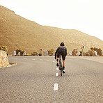 Fitness, cycling and sports man on a bicycle at sunset with mountain view in South Africa, exercise, freedom and health. 
Road, cyclist and marathon training by athletic male on morning cardio ride