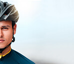 Man, face and bike helmet in training, workout and exercise on mockup space in Canada with cycling motivation, goals or health target. Portrait, sports cyclist and fitness athlete with winner mindset