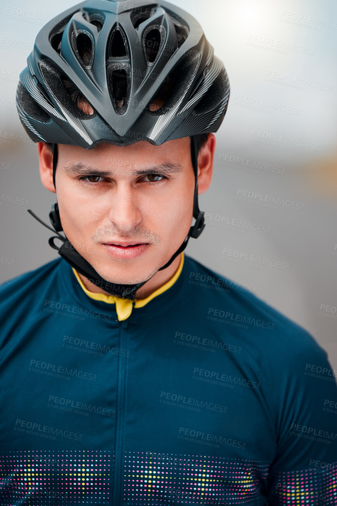 Buy stock photo Cycling, helmet and serious with a sports man outside, ready to ride or cycle for exercise and fitness. Workout, training and cardio with a male athlete riding with focus for health or endurance