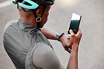 Cycling, smartwatch and phone by man cyclist tracking cardio, pulse and health on an online app in a road. Sports, fitness and watch with black man cycling and monitoring progress, heart and wellness