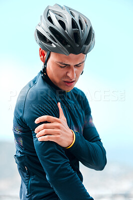 Sport, injury and arm pain with man cyclist during exercise routine outdoors, fitness, hurt and discomfort. Health, inflammation and sports injury by athletic guy holding shoulder pain after cycling