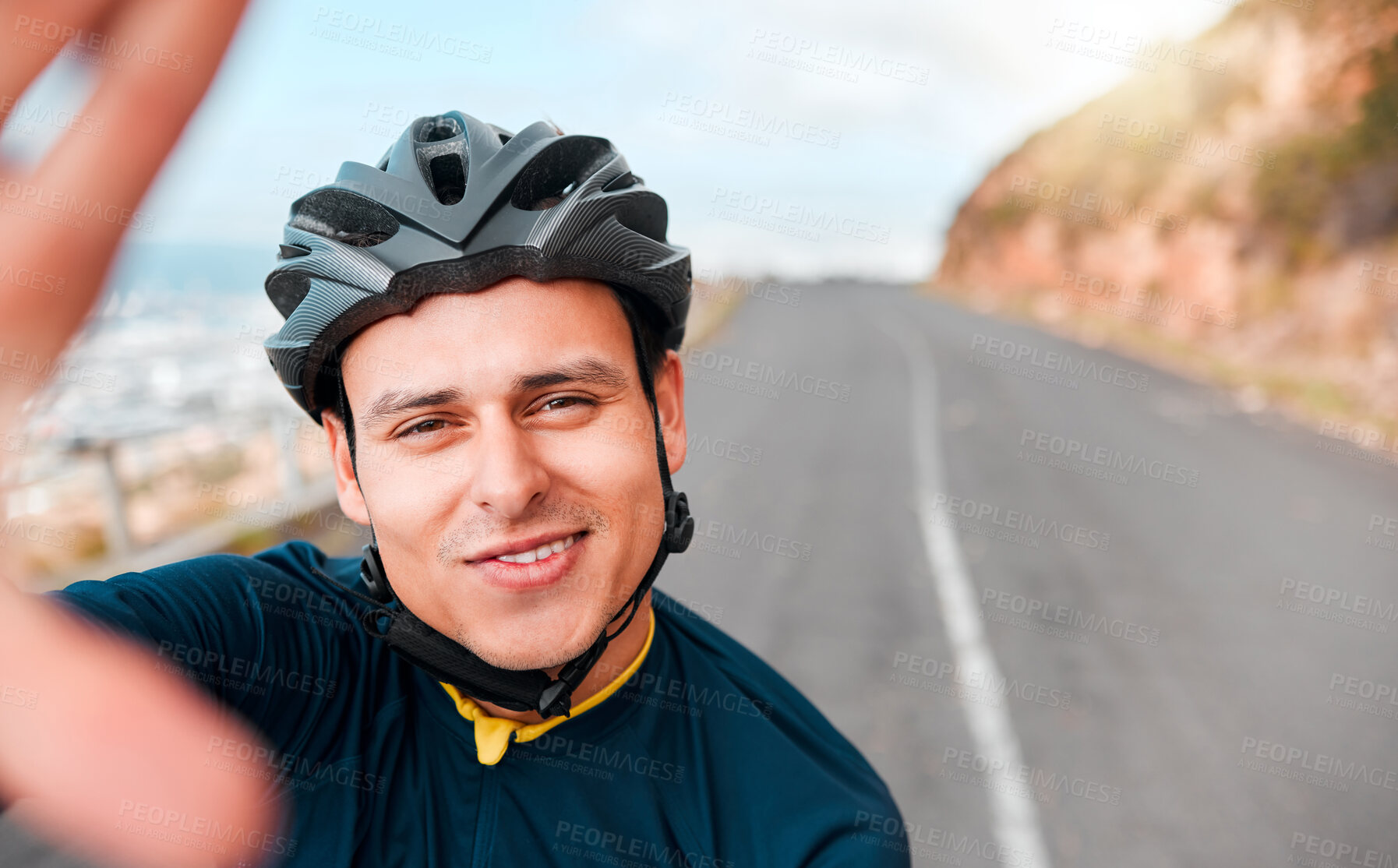 Buy stock photo Selfie, fitness and man cycling in the road on the mountains in Switzerland for adventure, peace and freedom. Face portrait of a young, happy and free athlete with photo while training in the street