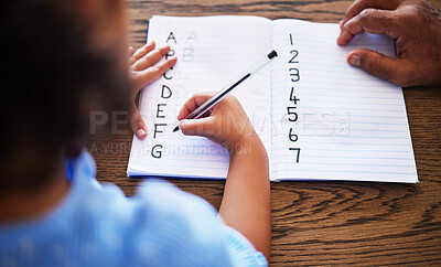 Child, learning and hands writing in notebook with study tutor for education, alphabet and maths. Knowledge, teacher and student with homework book for studying lesson at desk with top view.