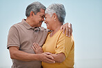 Senior couple, hug and love in care for marriage, relationship and romance in quality bonding time together in the outdoors. Happy elderly married man and woman with smile embracing retirement trip