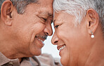 Love, family and face of elderly couple embracing, relax and smiling while bonding and sharing a romantic moment. Trust, support and elderly couple hug, commitment and understanding in their home