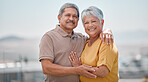 Couple, happy and outdoor portrait of senior love on retirement vacation in a city bonding and hugging with smile and care. Happiness, support and elderly man and woman being romantic in Puerto Rico 