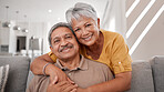 Portrait of elderly love, grandparents smile on sofa and old couple relax at home in happy retirement. Senior man, grandmother on couch and smile in living room getting hug from retired wife on couch