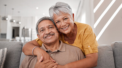 Buy stock photo Portrait of elderly love, grandparents smile on sofa and old couple relax at home in happy retirement. Senior man, grandmother on couch and smile in living room getting hug from retired wife on couch