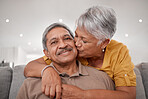 Senior couple, hug and kiss while bonding on sofa in house or Mexico home living room in safety, love or security. Portrait, smile and happy retirement elderly man and woman with life insurance trust