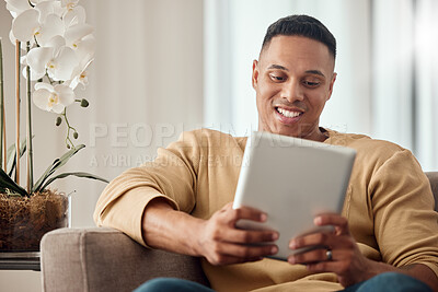 Buy stock photo Tablet, sofa and black man relax with website information, subscription service or surfing social media app in home living room. Happy man with home technology reading ebook on a digital application
