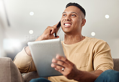 Buy stock photo Phone call, tablet and man networking, speaking and working on the internet from the sofa in his house. Happy, thinking and young freelancer speaking on a mobile with a search on the internet on tech