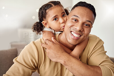 Buy stock photo Love, family and girl and father kiss on a sofa while bonding, relax and hug in a living room in their home together. Happy family, smile and portrait of loving child embrace parent on couch indoors