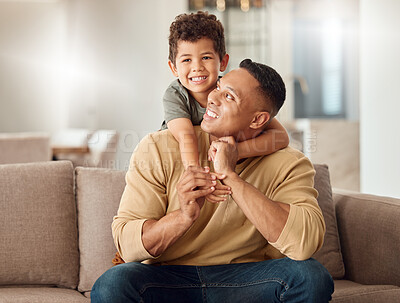 Buy stock photo Father, child and sofa with smile, back and together for portrait, happy and home in living room. Family, dad and boy on couch for bonding, playing and happiness in lounge for time, love and relax