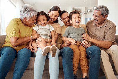 Buy stock photo Happy, big family and quality time bonding of children, parents and grandparents together on a sofa. Laughing kids having fun with mom, dad and grandparent on a home living room couch with happiness