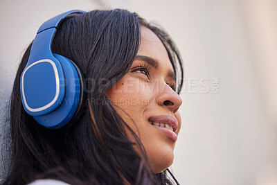 Buy stock photo Music, relax and woman with headphones in the city listening to podcast, radio or track. Vision, idea and close up of girl thinking in urban town with wireless earphones, enjoying weekend and freedom