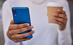 Smartphone in hand, technology and communication, social media check or internet search, 5g network during a coffee break. Woman, product placement, and web connection with mobile marketing closeup.