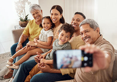 Buy stock photo Selfie, family and phone with a senior man taking a photograph with his relatives during a visit in their home. Love, retirement and technology with an elderly male posing for a picture in the house