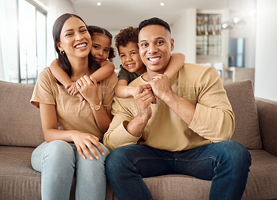 Buy stock photo Family, mother and father with hugging kids relaxing on living room sofa with smile for quality bonding time at home. Portrait of happy mama, dad and children smiling in happiness for break together
