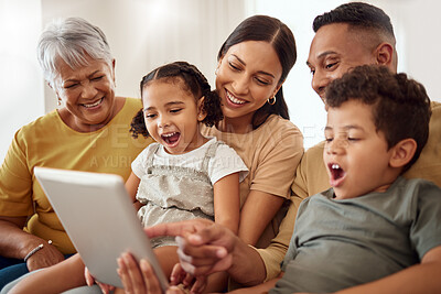 Buy stock photo Happy, family and online entertainment on tablet enjoying technology and bonding time together on living room sofa. Parents, grandma and kids relaxing on couch streaming on touchscreen at home
