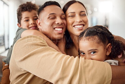 Buy stock photo Love, family and hug portrait in living room with Mexican parents and young kids in house. Care and happy latino man, woman and children enjoy cuddle together for care and affection in home