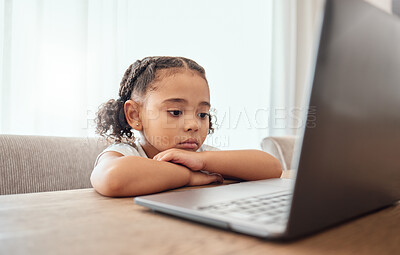 Buy stock photo Children, laptop and education with a girl learning from home online for growth or development. Computer, internet and study with a female child distance learning at a dining room table in the house
