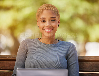 Buy stock photo Laptop, smile and woman with internet at a park, working and typing with 5g web connection on a bench. Portrait of a young, happy and freelance worker with a computer for business online in nature