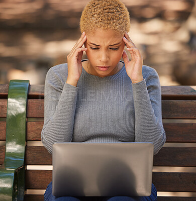 Buy stock photo Black woman, laptop and stress for exams, being anxious and headache for studies, outdoor and on bench. Female student, young lady and with digital device with anxiety, for results and burnout.