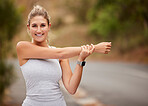 Fitness, woman and stretching arm for sports exercise, workout or training against a blurred background. Portrait of happy active female smile for warm up stretch for exercising, health and wellness