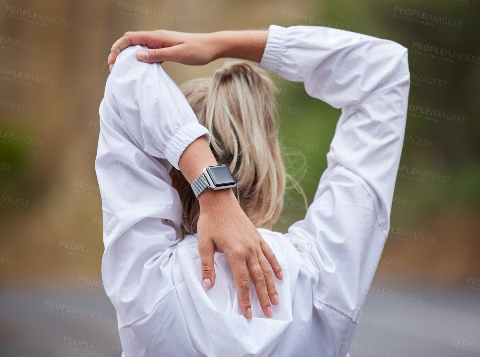 Buy stock photo Fitness, warm up and woman stretching in the park before exercising, running and workout. Health, wellness and sports girl doing stretch for back and arm muscles before exercise, ready to run on road