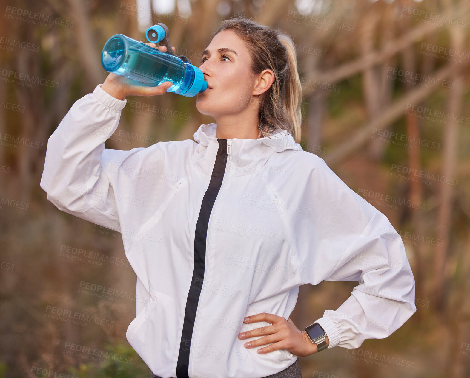 Buy stock photo Exercise, woman runner and on break drinking water doing workout, rest and sportswear being healthy, fitness or wellness. Female athlete, runner girl or training for thirsty, health or cardio outdoor