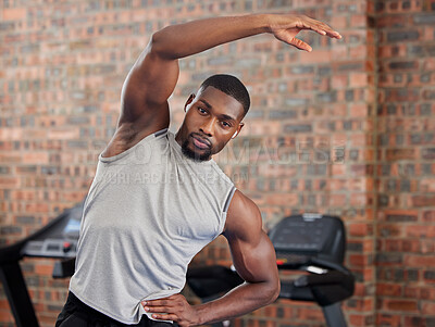 Buy stock photo Exercise, black man and stretching for workout, fitness and wellness being healthy, in sportswear and in gym with focus face. African American trainer, athlete or male for health, cardio and training