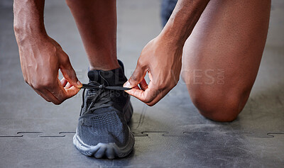 Buy stock photo Lace shoes, sports and man running workout, cardio and wellness gym training. Closeup black man feet, runner foot and athlete fasten sneakers, exercise and ready to start healthy fitness performance