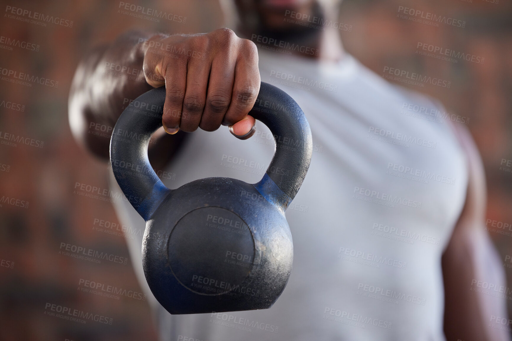 Buy stock photo Fitness, bodybuilder and black man kettlebell training, exercise or workout for powerful arm strength at gym. African, hand and strong sports athlete bodybuilding or weightlifting in a health club