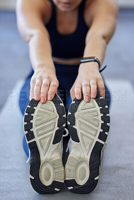 Buy stock photo Woman runner stretching, sports shoes and athlete touching toes on a yoga mat on floor for leg fitness warm up exercise.  Female athlete, training for flexibility and healthy cardio running workout 